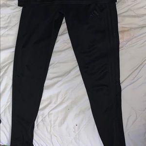All black Adidas sweatpants